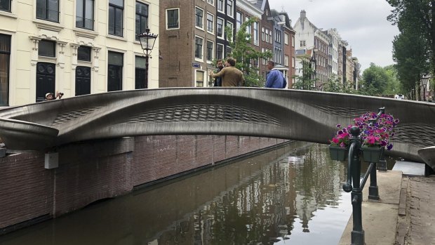 The new bridge is in the heart of Amsterdam's red light district.
