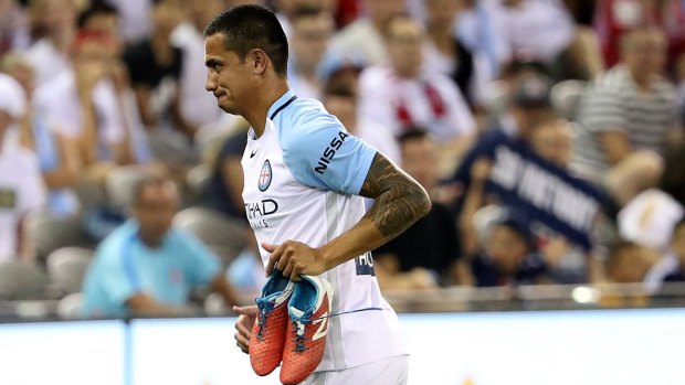 OUT: Tim Cahill leaves after being sent off against Melbourne Victory.