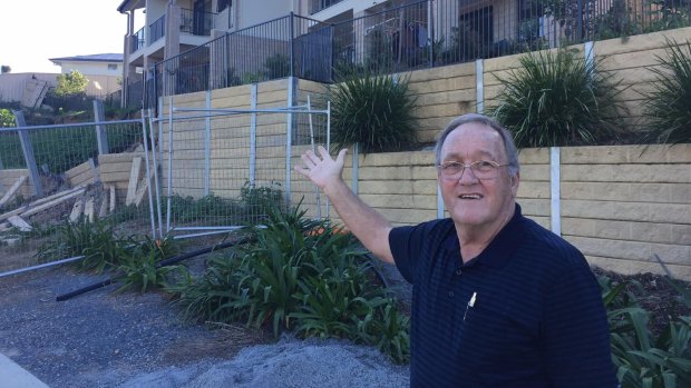 Dan Russell believes little is being done to fix the problems faced by the people living in the units if the soil slips continue.