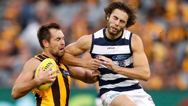 Geelong's James Parsons is in trouble for this bump on Luke Hodge.