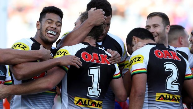 Houdini act: Panthers players celebrate a try en route to an improbable comback.
