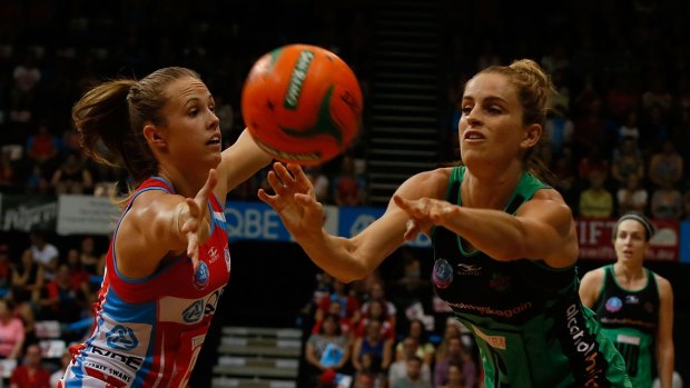 Pressure: Paige Hadley (Swifts, left) and Shae Brown (West Coast Fever) go hard at the ball in round four.
