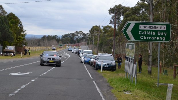 Cars wait to get through after the crash closed Culburra Road.