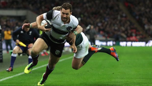 Putting his hand up: Luke Morahan scores for the Barbarians against South Africa at Wembley last weekend.