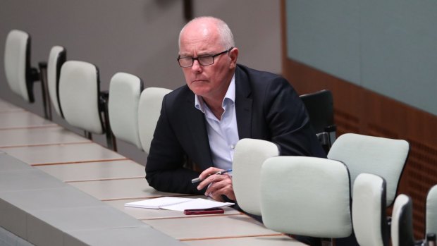 Veteran journalist Michael Gordon observes Question Time at Parliament House in Canberra. 