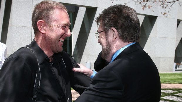 Fairfax Media photographer and Press Gallery president Andrew Meares with Senator Derryn Hinch after the rule change passed the Senate.