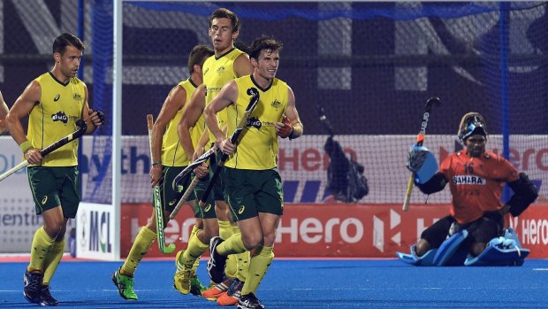 The Kookaburras celebrate a goal in their bronze medal Champions Trophy game against India.
