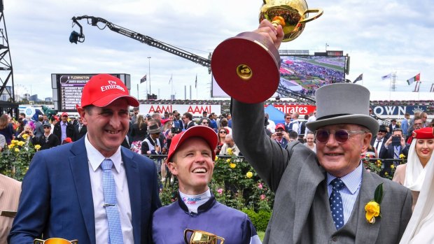 Almandin owner Lloyd Williams (left), with jockey Kerrin McEvoy with trainer Robert Hickmott after their 2016 Melbourne Cup win.