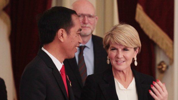 Indonesian President Joko Widodo welcomes Australian Foreign Minister Julie Bishop at Merdeka Palace in Jakarta, on Wednesday.