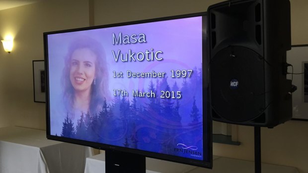 A screen at the funeral for slain schoolgirl Masa Vukotic.