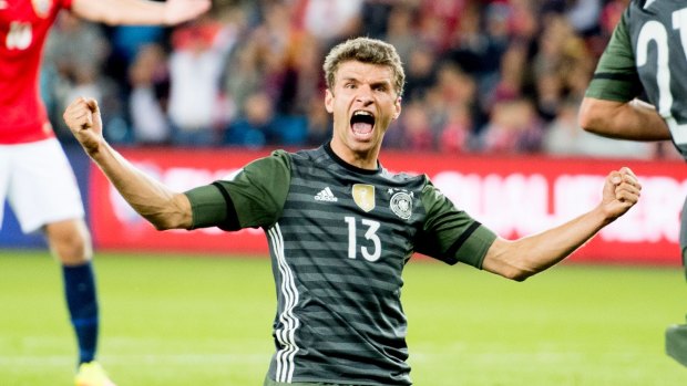 Germany's Thomas Muller celebrates after scoring his side's third goal.