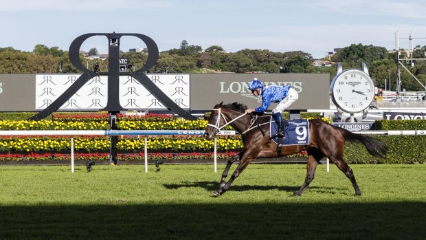 Winx strides towards the line to win the Queen Elizabeth Stakes on Championships Day 2.