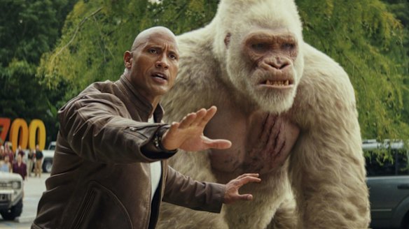 Dwayne Johnson as Davis Okoye and Jason Liles as George in Rampage.
