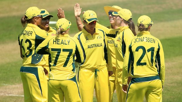 Australia celebrate another Kiwi wicket.