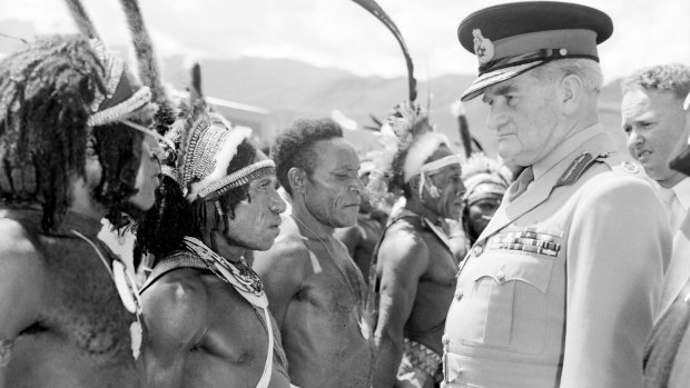 Sir William Slim (right) meeting Papuan highlanders at Goroka, 1956.