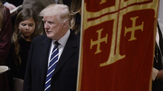 US President Donald Trump attends the National Prayer Service at the National Cathedral in Washington on his first day in office.