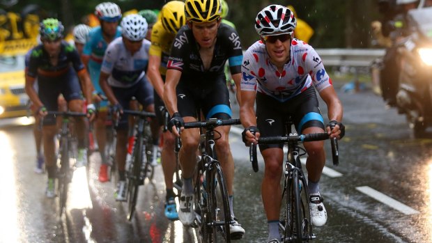 Storm troopers: Richie Porteleads his Sky teammates Geraint Thomas and Chris Froome during stage 12.