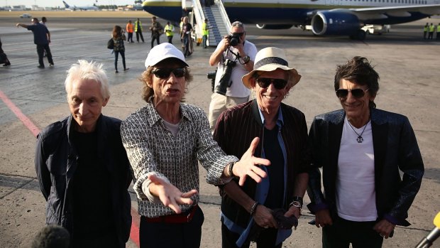 Charlie Watts, Mick Jagger, Keith Richards and Ronnie Wood of the Rolling Stones arrive at the Jose Marti International Airport in Havana.