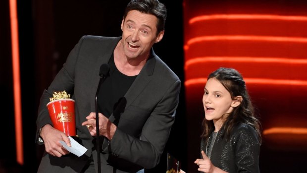 Hugh Jackman and Dafne Keen accept the MTV award for best duo.