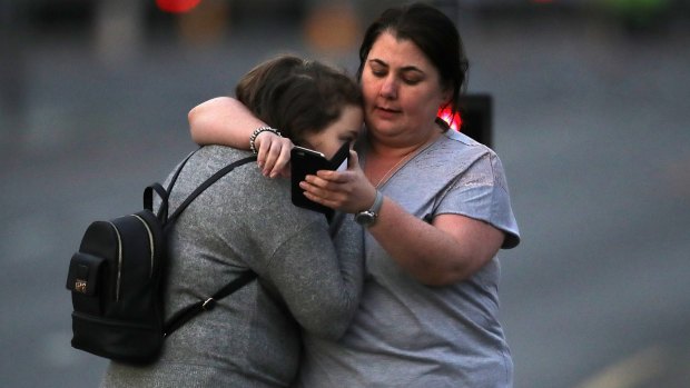 Ariana Grande concert attendees Vikki Baker and her daughter Charlotte, aged 13, leave the Park Inn where they were given refuge after the explosion at Manchester Arena.