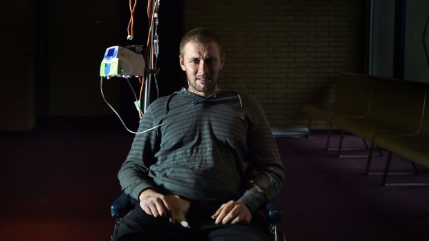 Matt Tudor, 30, sits in his wheelchair in Westmead Hospital as he recovers from horrific car crash injuries.