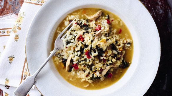 Red rice with chicken and spinach. 