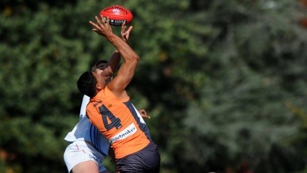 Contesting the ruck for Greater Western Sydney Giants in the AFL in 2012.