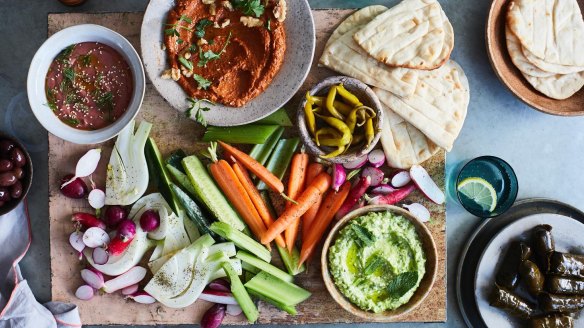 A colourful selection of vegan dips and veg.
