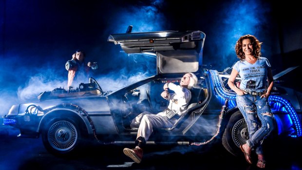 Back to the present: Claudia Wells and a replica DeLorean in a Campbellfield warehouse.