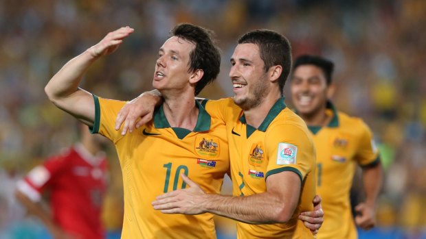 Team bubble: Robbie Kruse (left) didn't even know anything had happened.