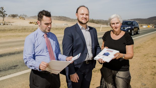 The Stories of Home report is being given to ACT election candidates. From left, executive officer of ACT Shelter Travis Gilbert, Independent candidate for the electorate of Yerrabi, Andrew Dewson, and ACTCOSS director Susan Helyar.