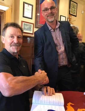 Phil Carman meets former boundary umpire Andrew Toy, who he struck in ACTAFL in 1983.