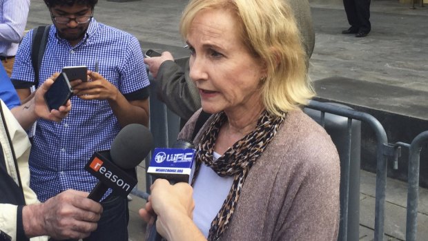 Lyn Ulbricht, mother of Ross Ulbricht, speaks to journalists outside court.