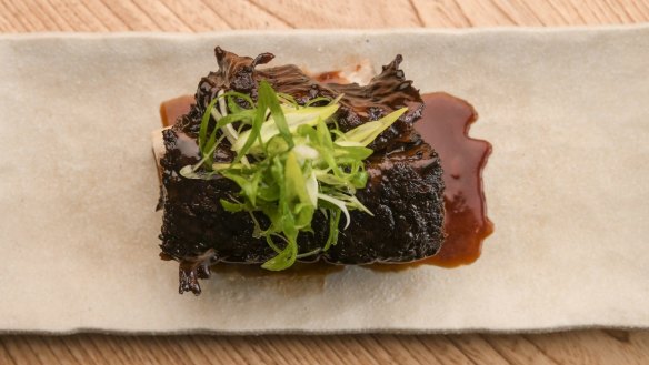 Teriyaki beef shortrib falls off the bone with no resistance.