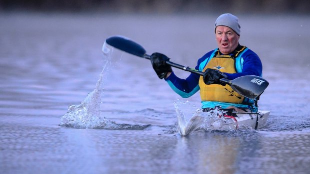 Kayaker John Preston from the Burley Griffin Canoe Club braves the start of winter.