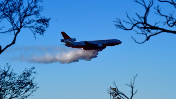 The RFS has been deployed its large aircraft to dump fire retardant to contain blazes.