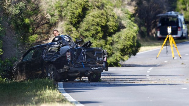 Police crash investigators on the  Mornington Peninsula Freeway after the accident.