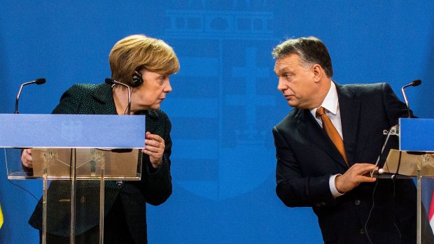 At odds over democracy: German Chancellor Angela Merkel and Hungarian Prime Minister Viktor Orban in Budapest, Hungary. 