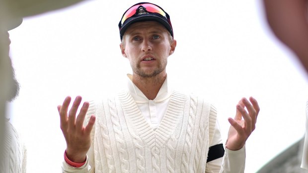 Taking a punt: Joe Root addresses England before the start of the Test.