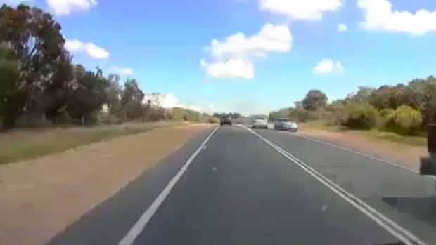 The footage shows how close the cars came to colliding head on.