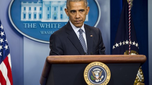 President Barack Obama listens to a question during a press conference at the White House.