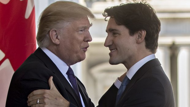 US President Donald Trump greets Canada's Prime Minister Justin Trudeau.