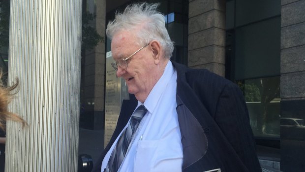 Paedophile priest Robert Flaherty leaves Downing Centre Court.