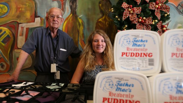 Johno Johnson selling puddings in the city with his granddaughter Christina Poeltl in December 2013. 
