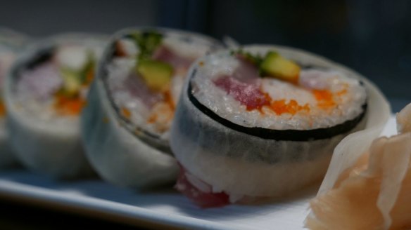 Chef Nobu's Melbourne sushi roll with snow crab, tuna, kingfish, hapuka, prawn, smelt roe, avocado, fresh wasabi, spring onion, nori and daikon radish.