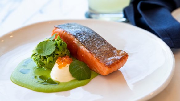 King Ora salmon with a velvety pea veloute and creme fraiche.