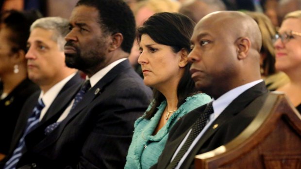 South Carolina Governor Nikki Haley (centre) attends a prayer vigil for the victims of the shooting at Emanuel AME Church in June.