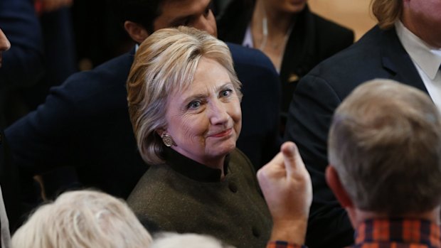 Democratic presidential candidate Hillary Clinton greets audience members after a campaign event at Berg Middle School, Iowa.