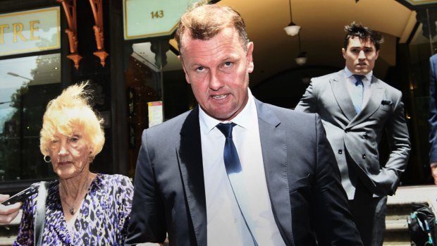 Celebrity accountant Anthony Bell leaving court with mum Shirley. 