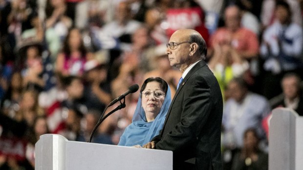 Khizr Khan, with his wife Ghazala, speaks at the Democratic National Convention in Philadelphia on July 28.